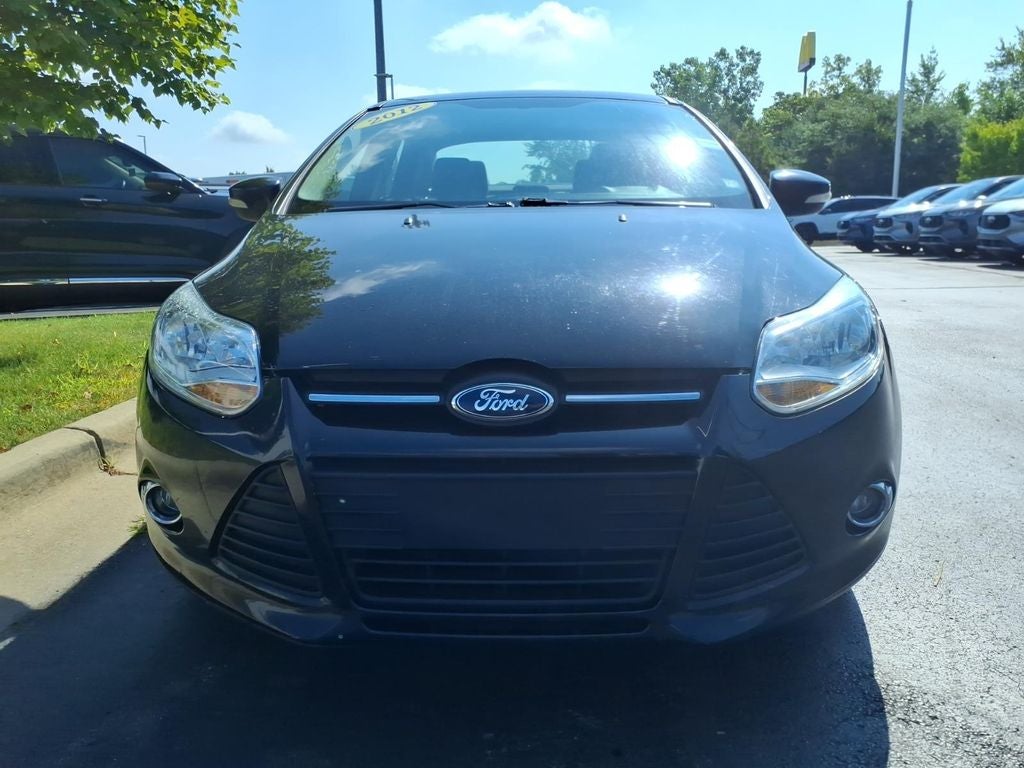 Used 2012 Ford Focus SE with VIN 1FAHP3F20CL354778 for sale in Dundee, MI
