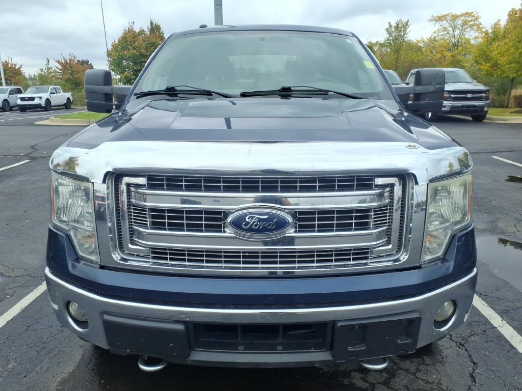 Used 2014 Ford F-150 XLT with VIN 1FTFW1ETXEFC20901 for sale in Dundee, MI