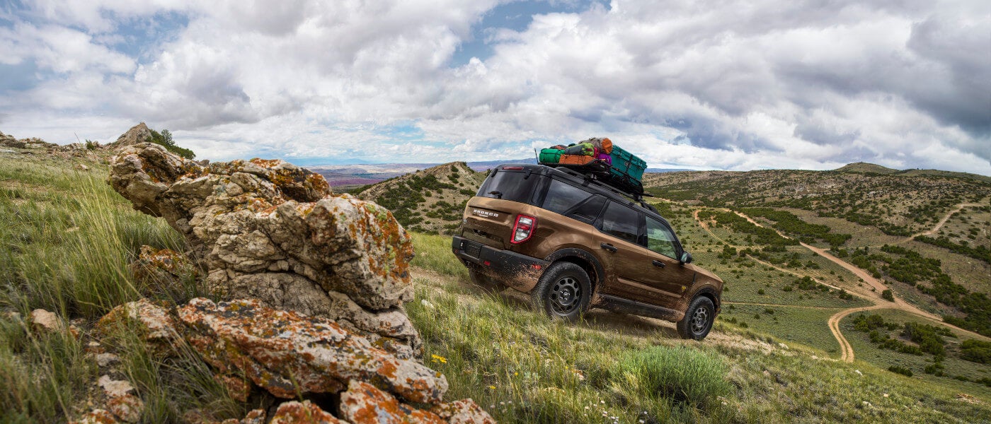 2025 Ford Bronco Exterior Driving Through Grassy Hills