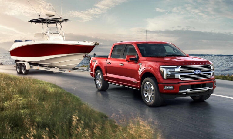 2025 Ford F-150 Exterior Towing A Boat By Lake