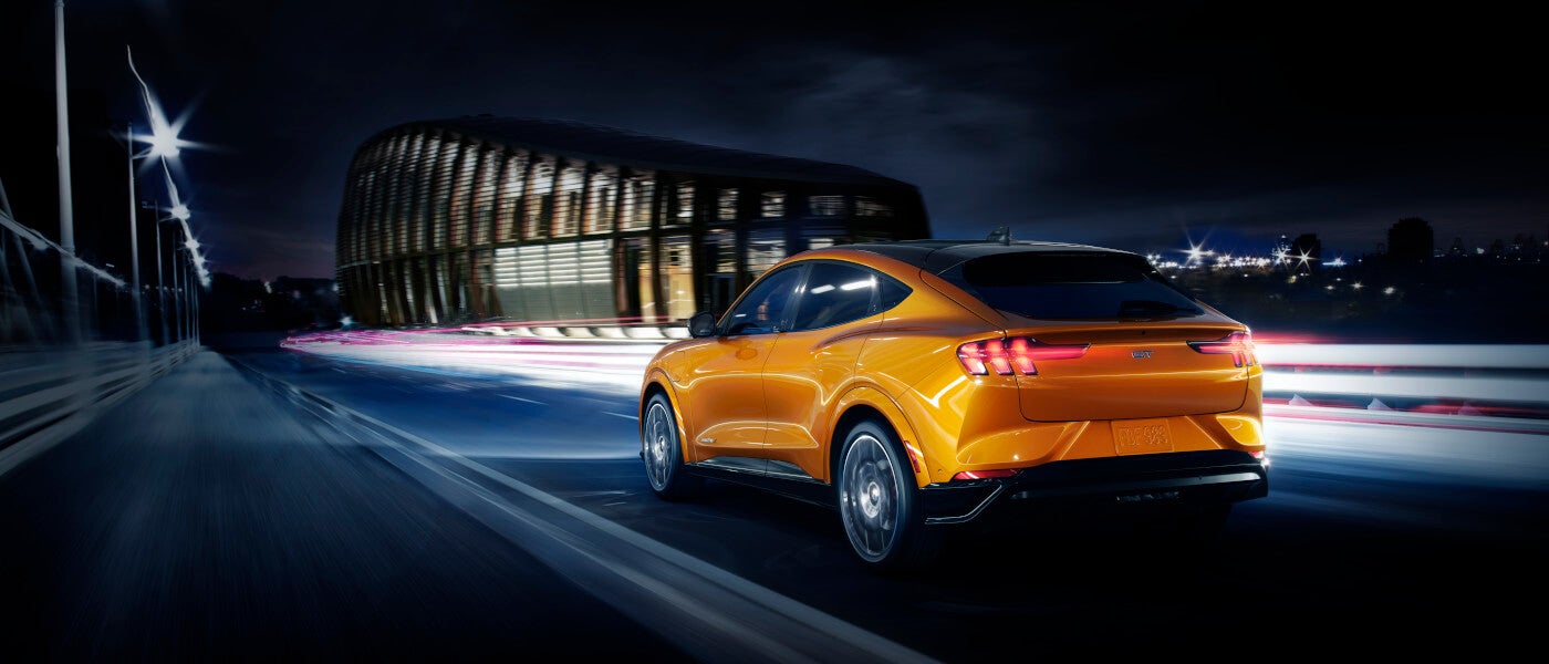 2025 Ford Mustang Mach-E Exterior Driving By Theater At Night